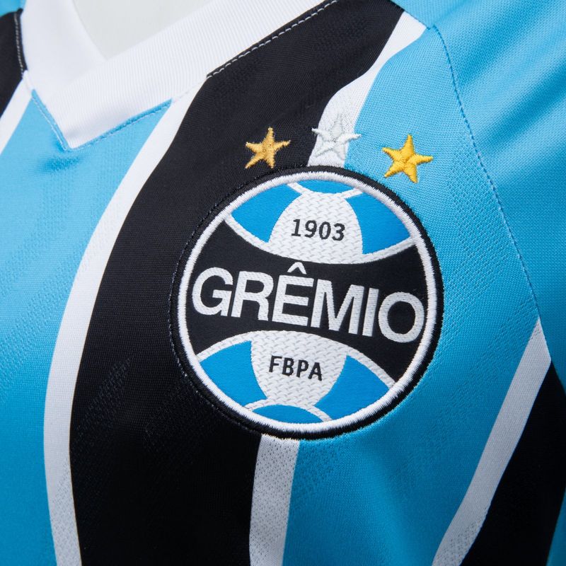 Camisa_Fem_Umbro_Of1_2025_Torcedora_SN_1291885_Detalhe_Simbolo.jpg