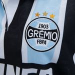 Camiseta_Fem_Retro_Renner_1995_1025098_Detalhe_Simbolo.jpg