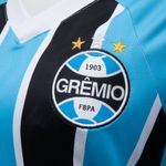 Camisa_Fem_Umbro_Of1_2025_Torcedora_SN_1291885_Detalhe_Simbolo.jpg
